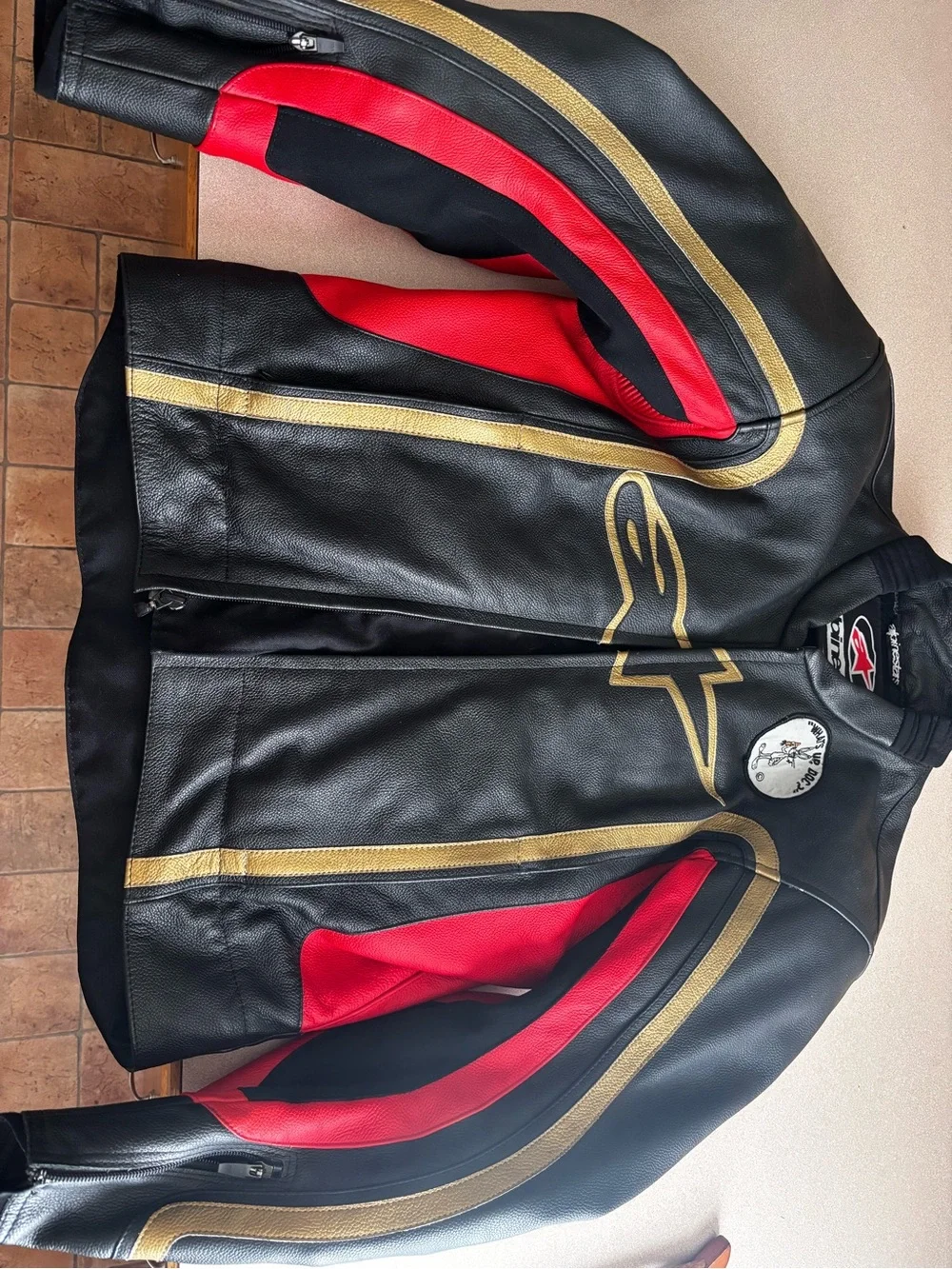 Alpinestars Black Leather Jacket with Red & Gold Accents